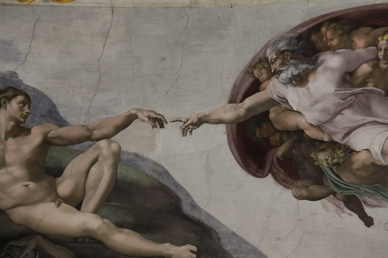 La Création d’Adam de Michel-Ange au plafond de la chapelle Sixtine